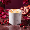 White marble candle refill in marble-pattern jar with two lit wicks