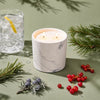 White marble candle refill in marble-look jar with two lit wicks