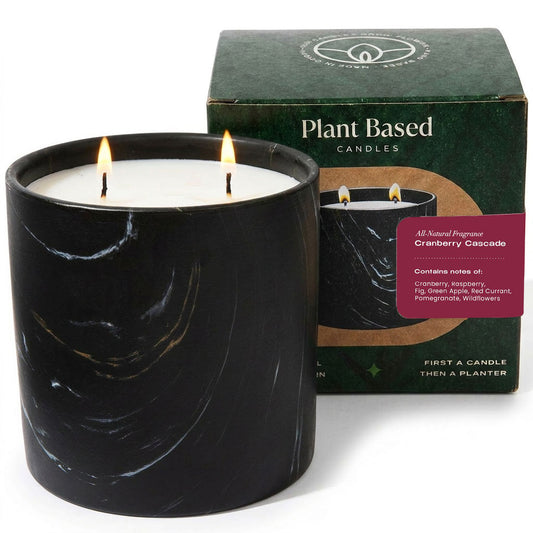 Black Marquina candle in black ceramic jar with white wax and two flames