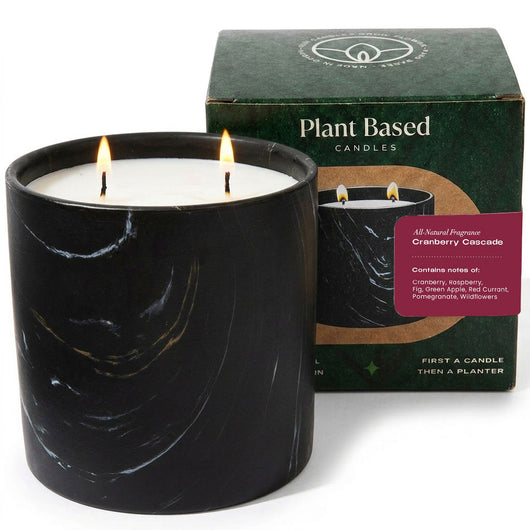 Black Marquina candle in black ceramic jar with white wax and two flames