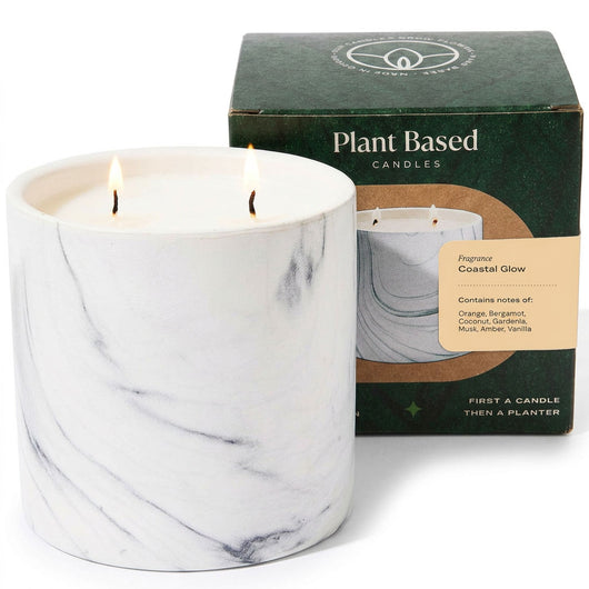 White marble-style candle jar with two flames, plant-based candle in wax