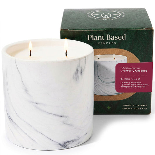 White marble-finish candle with two flames, 17oz, in plant-based candle packaging