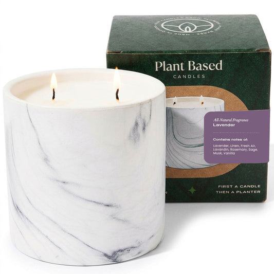 White marble-pattern candle jar with two flames, plant-based candles box behind