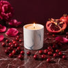 White marble-pattern candle refill with lit wick, gray swirls on white container