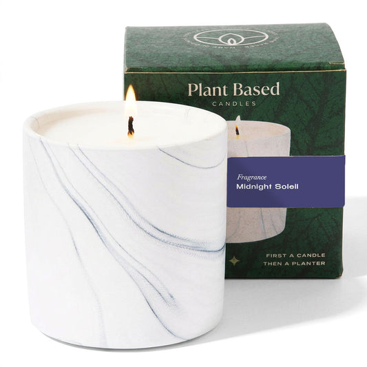 White marble wax candle with lit wick in a white tumbler, 6 oz