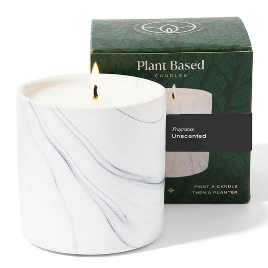 Unscented white marble candle in white jar with blue-gray marbling, lit