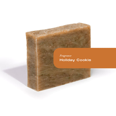Organic soap bar labeled Holiday Cookie, rectangular tan speckled