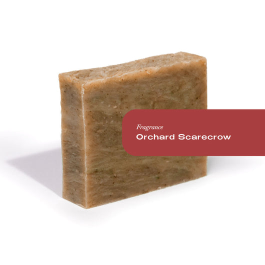 Organic soap bar with label 'Orchard Scarecrow' for fragrance
