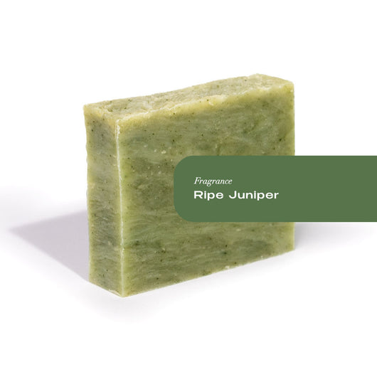 Organic soap bar, pale green, with overlay text: Fragrance Ripe Juniper