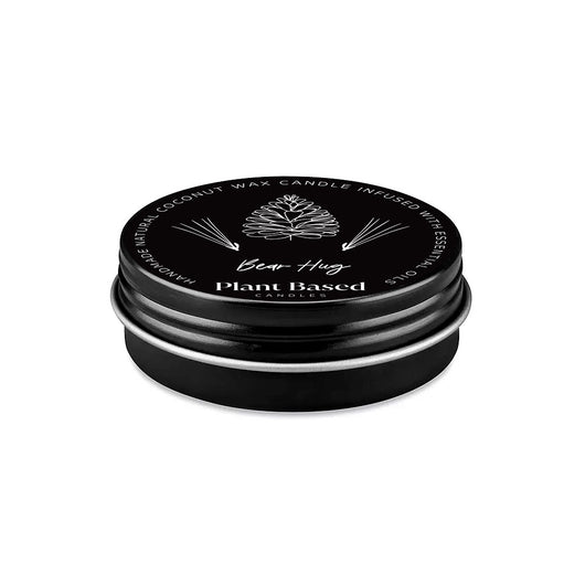 Black plant-based tealight tin lid, Bear Hug logo and pine-needle graphics