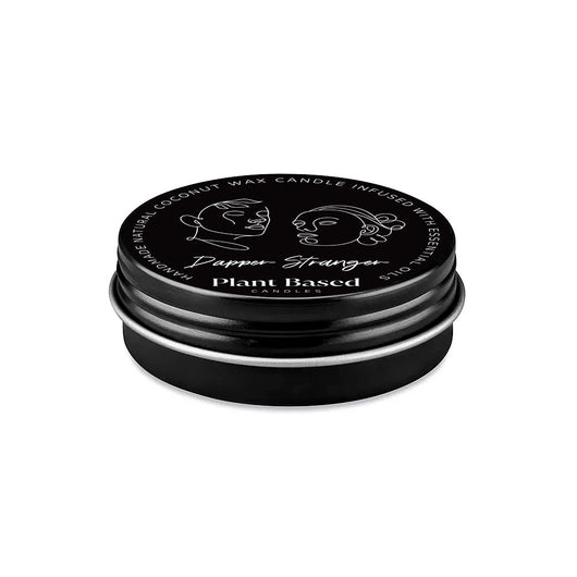 Tealight candle in black metal tin, lid with embossed Dapper Stranger design